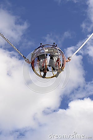 Uspide-down on bungee revolutions at Oktoberfest, Stuttgart Editorial Stock Photo