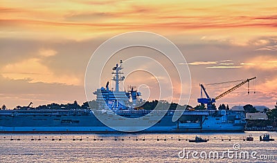 USS Roosevelt at Sunset Stock Photo