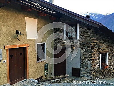 Usseaux village in Piedmont region, Italy. Narrow splendid street, roof and peace Stock Photo