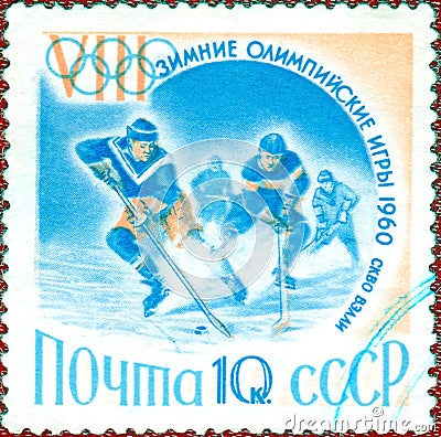 Postage stamp printed in the USSR with the image of hockey players and the inscription `VIII Winter Olympics 1960, Squaw-Valley` Editorial Stock Photo