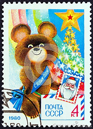 USSR - CIRCA 1979: A stamp printed in USSR from the `New Year` issue shows Misha Olympic mascot, circa 1979. Editorial Stock Photo