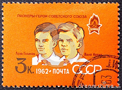 USSR - CIRCA 1962: A stamp printed in the USSR Russia shows Golikov and Kotik from the series 40 Anniversary of All Editorial Stock Photo