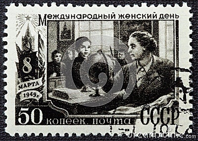 USSR - CIRCA 1949: stamp printed in the USSR Russia shows a woman teacher with inscription International Women's Day Editorial Stock Photo