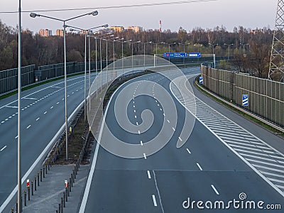 Usually full of car, now empty highway A4 due to the coronavirus pandemic. On signposts names of town and directions in Poland. Stock Photo