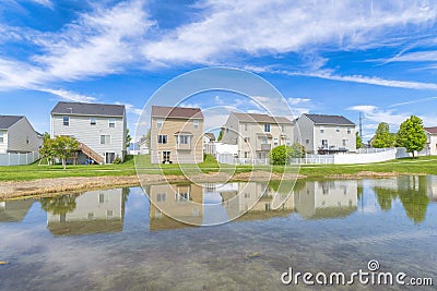 Utah valley community with reflective lake waterfront Stock Photo