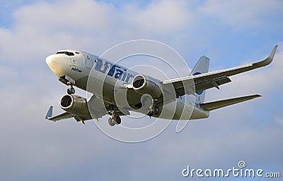 The UTair Boeing 737-500 (VQ-BPO) landing Editorial Stock Photo