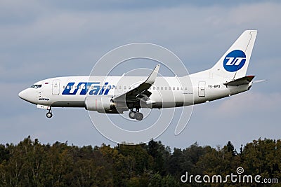 UTair Boeing 737-500 VQ-BPO passenger plane arrival and landing at Munich Airport Editorial Stock Photo