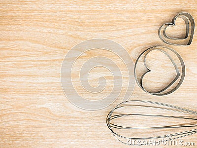 Utensil Kitchen stainless and whisk for cooking on wooden background. Top view white copy space. Stock Photo