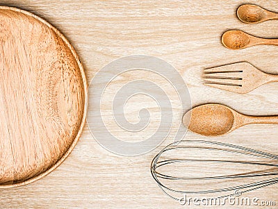 Utensil Kitchen Wooden and stainless whisk for cooking on wooden background. Top view white copy space. Stock Photo