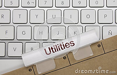 Utilities - Inscription on White Keyboard Key Stock Photo