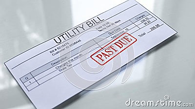 Utility bill past due, seal stamped on document, payment for services, charges Stock Photo