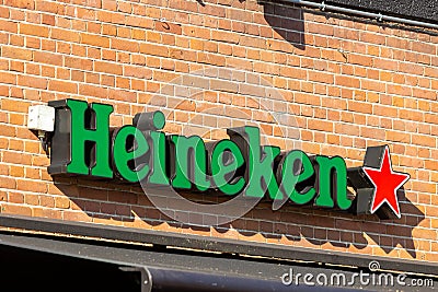 Heineken sign logo. Heineken is a Dutch multinational brewing company Editorial Stock Photo