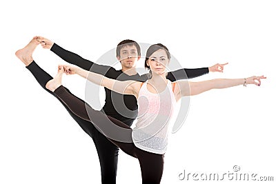 Utthita Hasta Padangushthasana yoga pose with partner, close-up Stock Photo