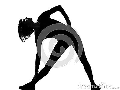 Utthita trikonasana triangle pose position woman Stock Photo