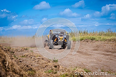 UTV buggy and 4x4 off road vehicle in sandy track. Buggy extreme riding Editorial Stock Photo