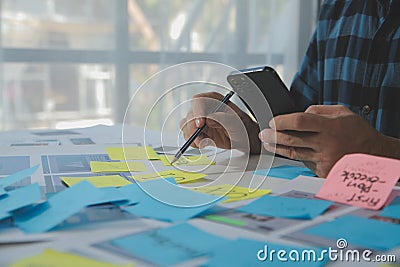 ux Graphic designer creative sketch planning application process development prototype wireframe for web mobile phone . User Stock Photo