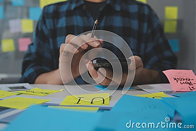 ux Graphic designer creative sketch planning application process development prototype wireframe for web mobile phone . User Stock Photo