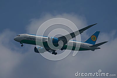 Uzbekistan Airways Boeing 787 Dreamliner descends for landing at JFK International Airport in New York Editorial Stock Photo