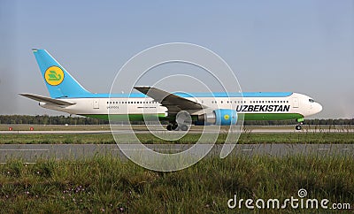 Uzbekistan Airways plane landing on Frankfurt Airport, FRA Editorial Stock Photo