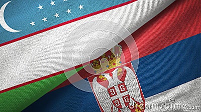 Uzbekistan and Serbia two flags textile cloth, fabric texture Stock Photo