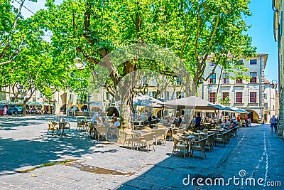 UZES, FRANCE, JUNE 20, 2017: Place aux Herbes in the center of Uzes, France Editorial Stock Photo