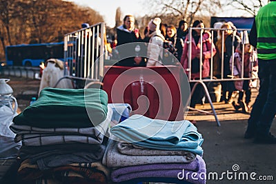 Uzhhorod, Ukraine - 16 March 2022: Humanitarian assistance of volunteers. People are fleeing the war in Ukraine. Go to the border Editorial Stock Photo