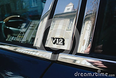 V12 engine sign on jaguar fast vintage glass Editorial Stock Photo