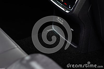 12V and 220v power outlet socket in the car. Stock Photo