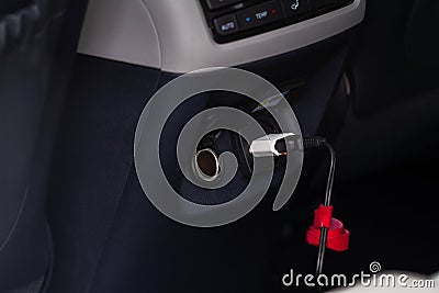 220v power outlet socket in the car. Stock Photo