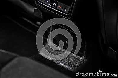 12V and 220v power outlet socket in the car. Stock Photo