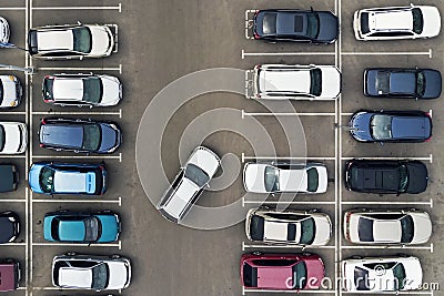 The only vacant parking space in parking lot. Navigation in the car park. Searching for vacant space for parking. The parking is j Stock Photo