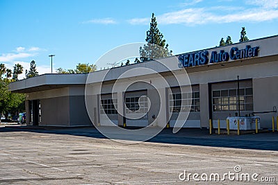 The vacant Sears Auto Center facility at at 1000 Northridge Fashion Ctr. will be the site of the Porto`s Bakery in Northridge. Editorial Stock Photo