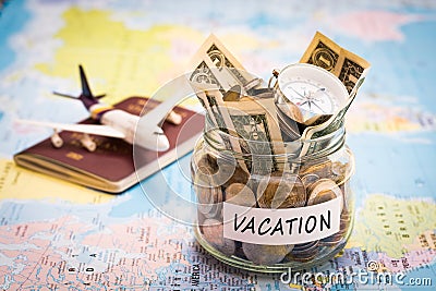 Vacation budget concept with compass, passport and aircraft toy Stock Photo