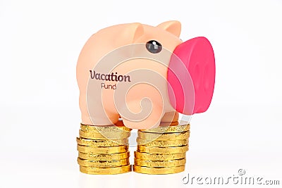 Piggy Bank & Coins for vacation fund. Stock Photo