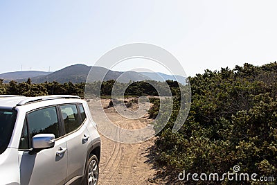 A white Jeep Renegade is parked on a dirt road. All wheel drive. Editorial Stock Photo