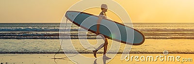 Vacation Silhouette Of A Surfer Carrying His Surf Board Home At Sunset With Copy Space BANNER, long format Stock Photo