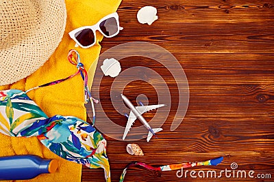 Vacation travel equipment Straw hat, sunglasses And marine objects, shells, on wooden floor - Image Stock Photo