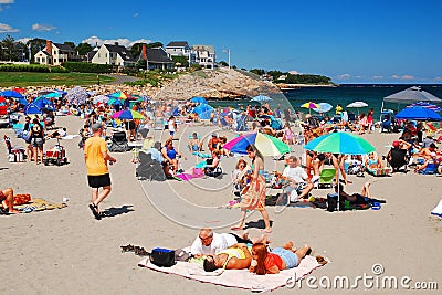 Vacationers crowd the beach day Editorial Stock Photo