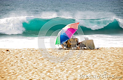 Vacationers at the Hawaiian beach Stock Photo