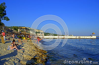 Vacationers relaxing on Balchik beach Editorial Stock Photo