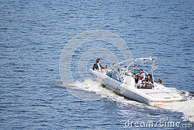 Vacationers ride boats and boats on the river Editorial Stock Photo