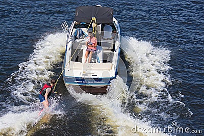 Vacationers ride boats and boats on the river Editorial Stock Photo