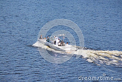 Vacationers ride boats and boats on the river Editorial Stock Photo