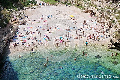 Vacationers on a stony beach Editorial Stock Photo