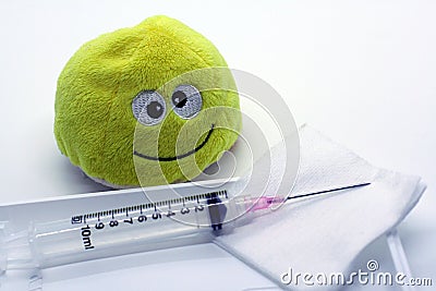 Vaccination syringe with happy smiley face Stock Photo