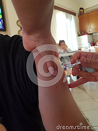 Vaccination vaccine flu coronavirus covid 19 injection drop Editorial Stock Photo