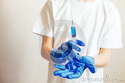 Cropped view of pediatrician doing injection with vaccine Stock Photo