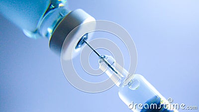 Vaccine vial dose flu shot drug needle syringe Stock Photo