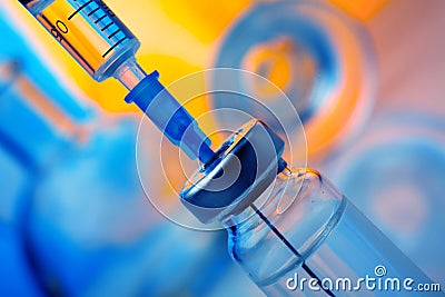 Vaccine vial dose flu shot drug needle syringe,medical concept vaccination hypodermic injection Stock Photo