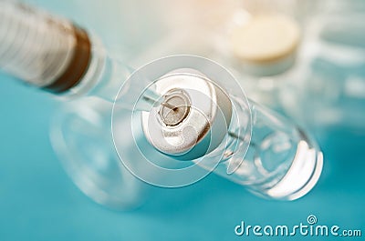 Vaccine vial dose with needle syringe, medical concept vaccination Stock Photo